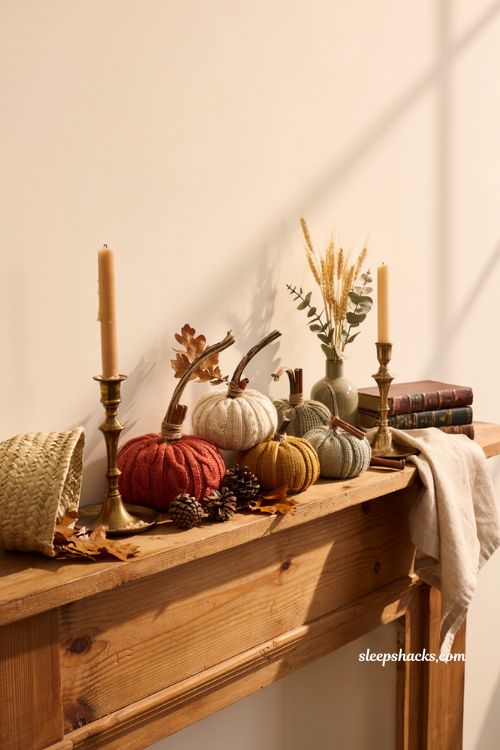 Craft pumpkin ideas with cozy diy sweater sleeve pumpkins for fall mantel decor