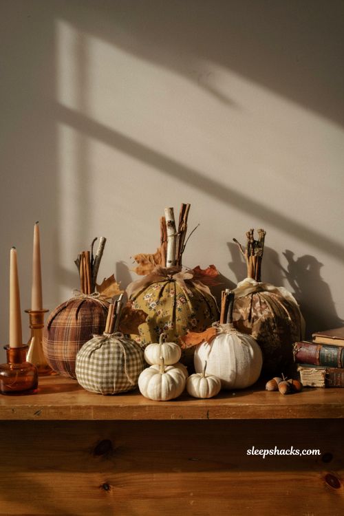 Craft pumpkin ideas with diy embroidery hoop fabric pumpkins on a cozy autumn mantel