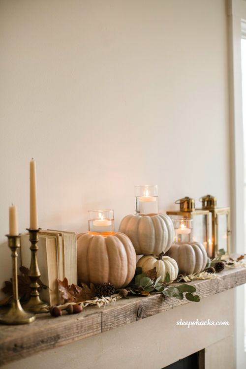 Craft pumpkin ideas with faux pumpkin floating votive candle centerpiece for cozy fall decor