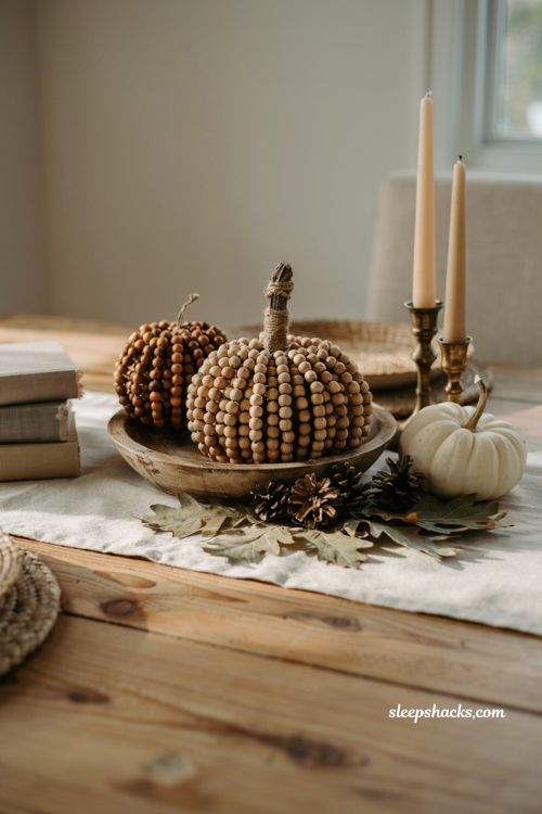 Craft pumpkin ideas with natural wood bead pumpkins for modern farmhouse fall centerpiece