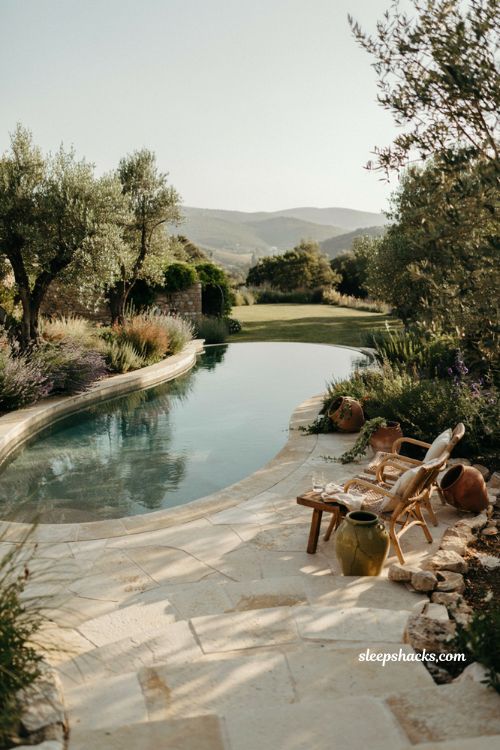 Curved infinity pool ideas for natural garden backyard