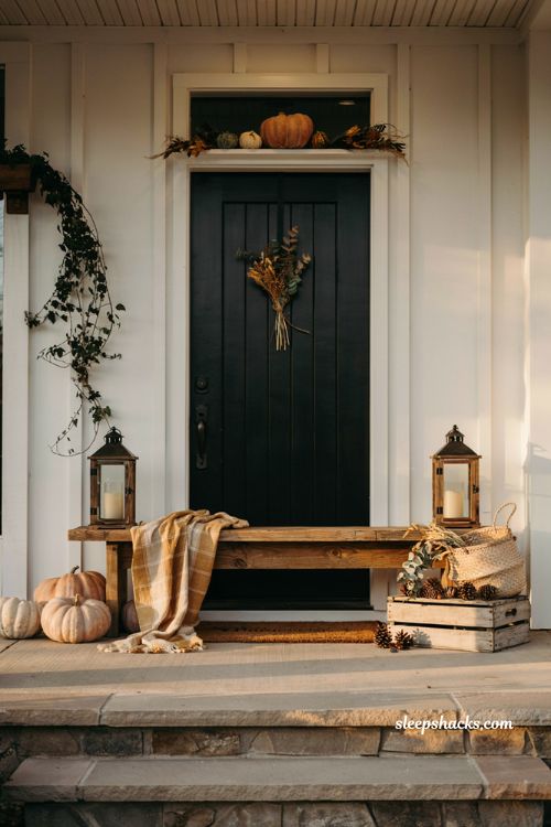 Cute pumpkin decorating ideas with mini pumpkins above the front door transom for charming fall entryway