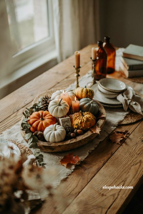 Cute pumpkin decorating ideas with rustic dough bowl pumpkin centerpiece for cozy farmhouse fall table 