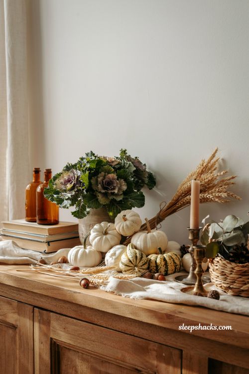 Cute pumpkin decorating ideas with white pumpkins and fall organics for cozy farmhouse autumn decor
