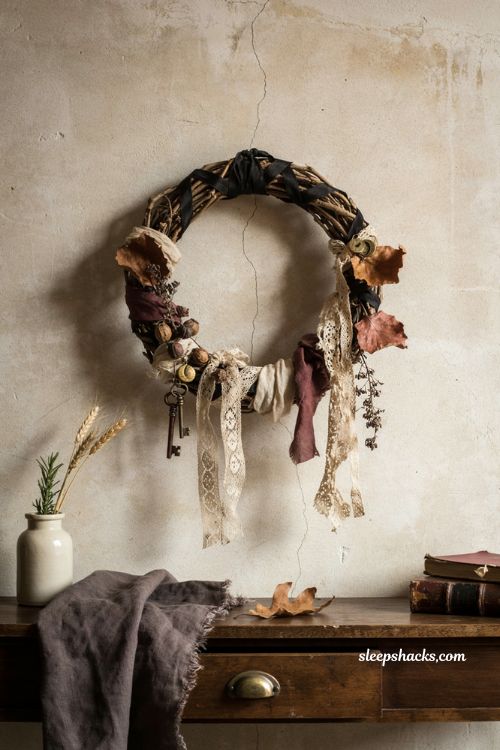 DIY Halloween wreath ideas with gothic dried branches vintage lace dark botanical decor