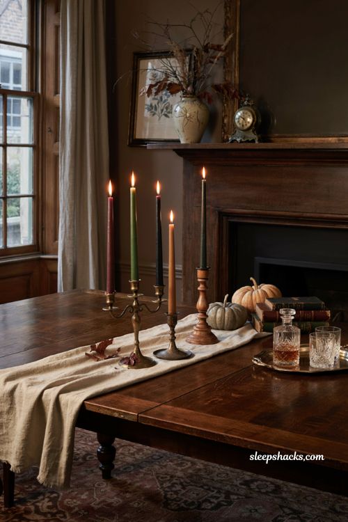 Dark taper candles elegant Halloween decor with Gothic dining room style
