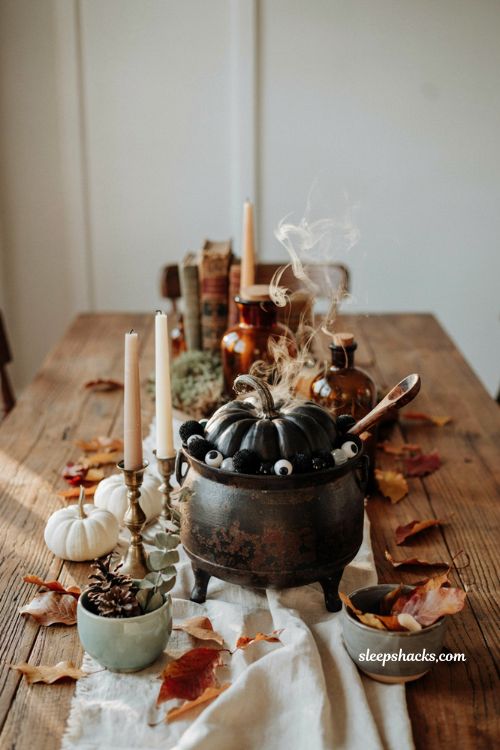 Decorate pumpkin ideas with witch cauldron pumpkin centerpiece for cozy Halloween farmhouse decor