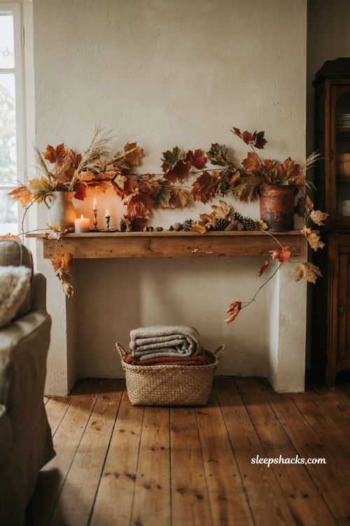 Diy faux fall leaf garland with lush autumn stems for farmhouse mantel decor
