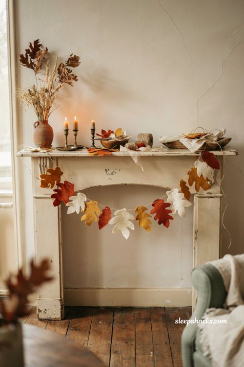 Diy felt leaf garland with rust mustard and cream leaves for fall mantel decor
