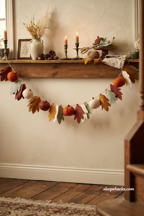 Diy felt pumpkin and leaf garland with cozy fall mantel decor