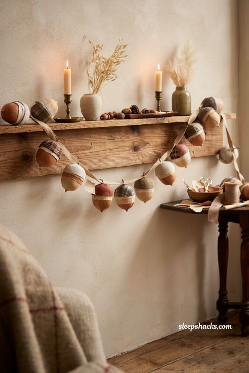 Diy paper and fabric acorn garland with rustic fall mantel and console decor