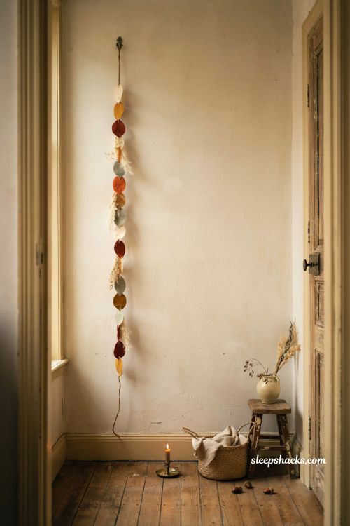 Diy vertical fall leaf garland hanging for narrow walls and cozy entryway decor