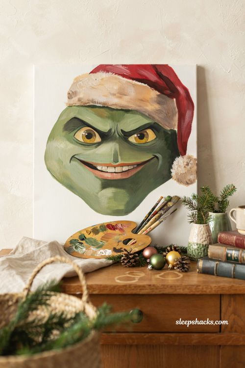 Easy Grinch inspired green Christmas face painting on canvas with Santa hat