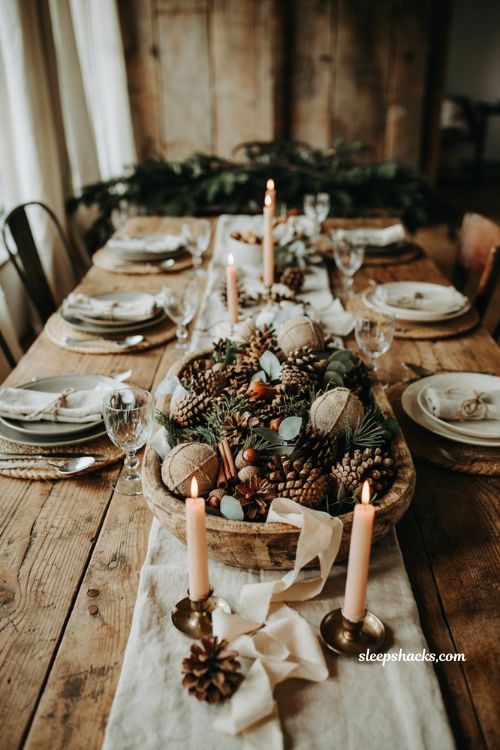 Easy christmas centerpieces for table with dough bowl filled with pinecones and burlap ornaments
