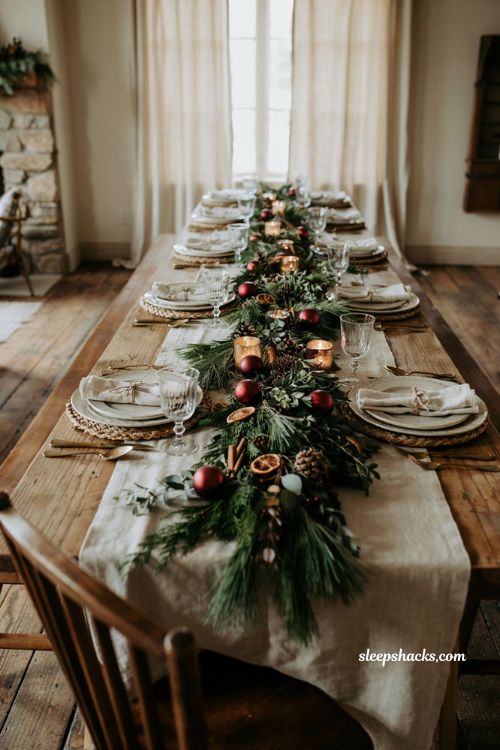 Easy christmas centerpieces for table with greenery garland runner and gold candle holders