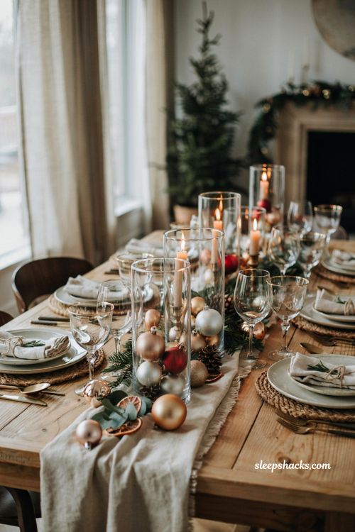 Easy christmas centerpieces for table with ornament filled glass cylinders and festive holiday decor