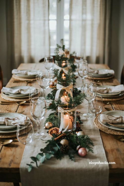 Easy christmas centerpieces for table with pine wrapped glass candle holders and rustic holiday decor