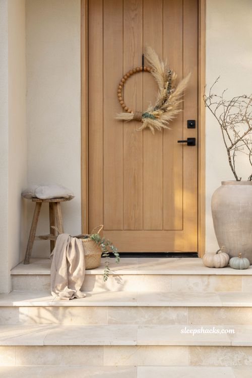 Easy fall wreaths with boho pampas grass crescent wreath and raffia