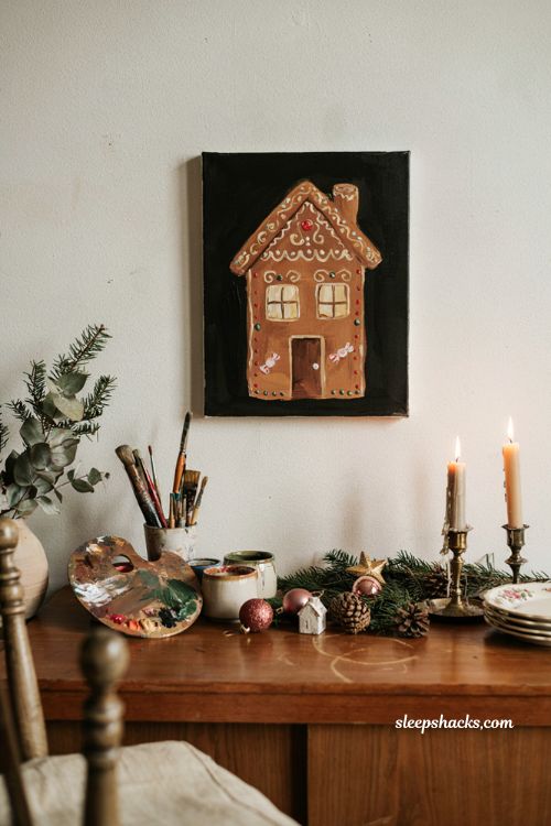 Easy gingerbread house Christmas painting on black canvas with colorful icing