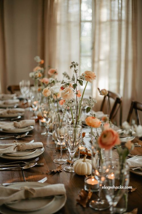 Elegant champagne flute mini bouquet centerpiece ideas with ranunculus and lisianthus for a fall baby shower