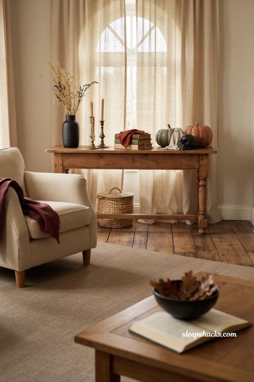 Fall Halloween decor with black vases dried stems and easy seasonal transition styling