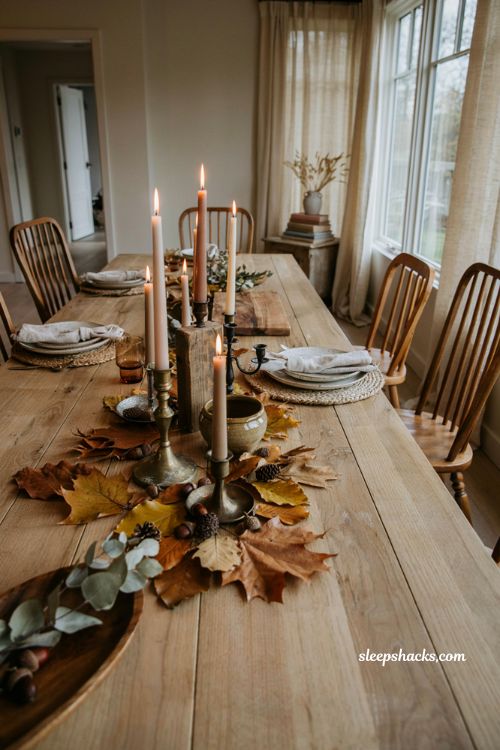 Fall candle centerpiece with foraged leaves and vintage candle holders
