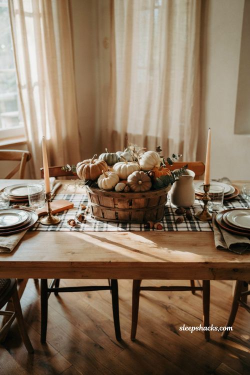 Fall centerpiece with woven basket plaid runner and neutral pumpkins
