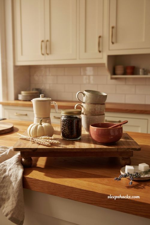 Fall coffee bar decor ideas with footed wooden tray mugs coffee maker and warm accents 