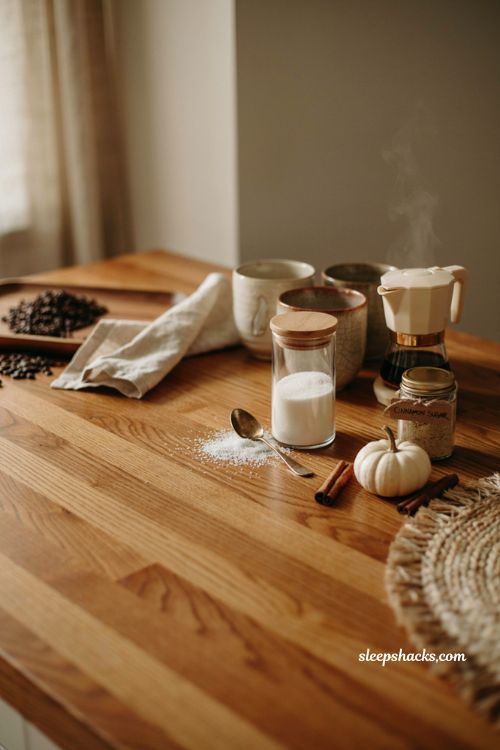 Fall coffee station ideas with glass sugar jar cozy mugs and functional decor