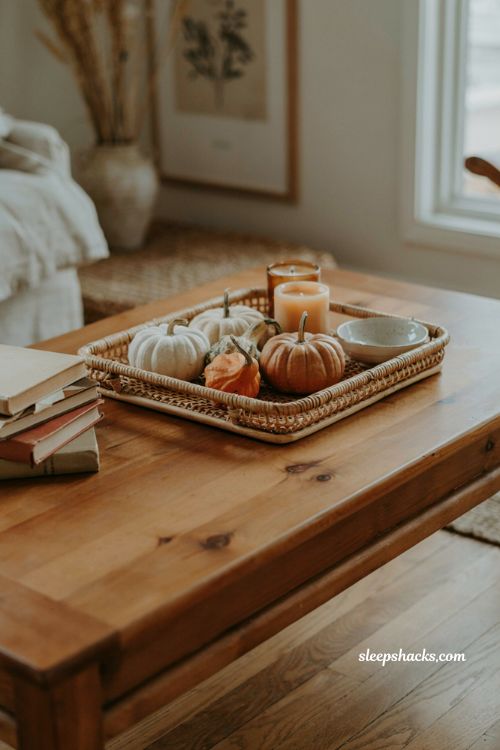 Fall coffee table decor with mini pumpkins dried gourds and cozy autumn accents 