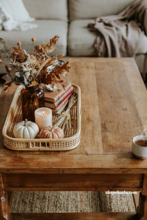 Fall coffee table decor with open space functional tray and cozy autumn vignette 