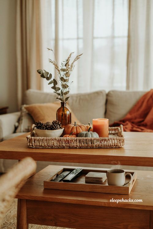 Fall coffee table decor with styled seasonal tray and functional tray for remotes