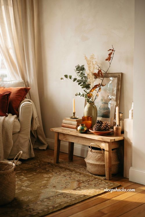 Fall console table vignette ideas with warm neutral decor and natural textures