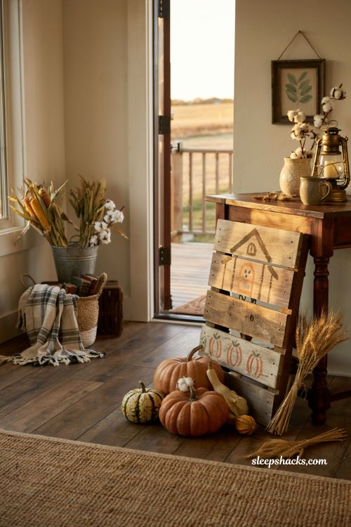 Fall craft ideas with pallet wood farmhouse sign and pumpkin porch decor