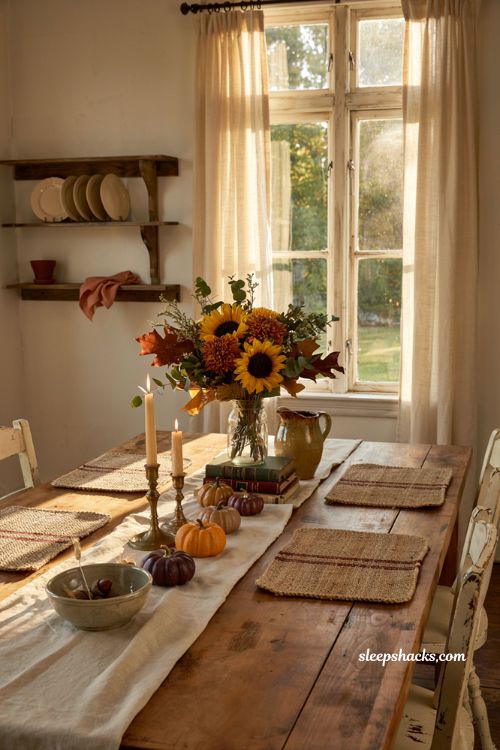 Fall decor on a budget with dollar store faux greenery in a cozy farmhouse centerpiece