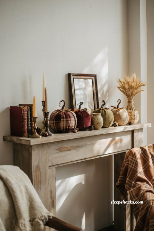 Fall decor on a budget with fabric covered foam pumpkins on a cozy farmhouse mantel