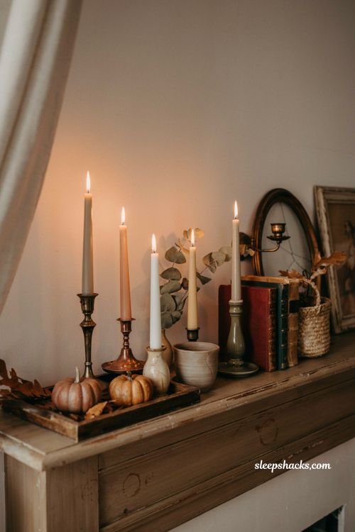 Fall decor on a budget with thrifted vintage candlestick holders and cozy mantel styling