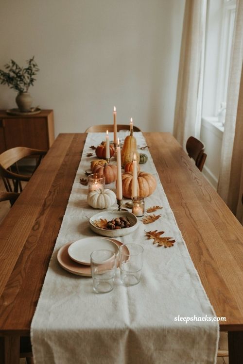 Fall dining table decor with white orange pumpkins and candles simple autumn centerpiece 