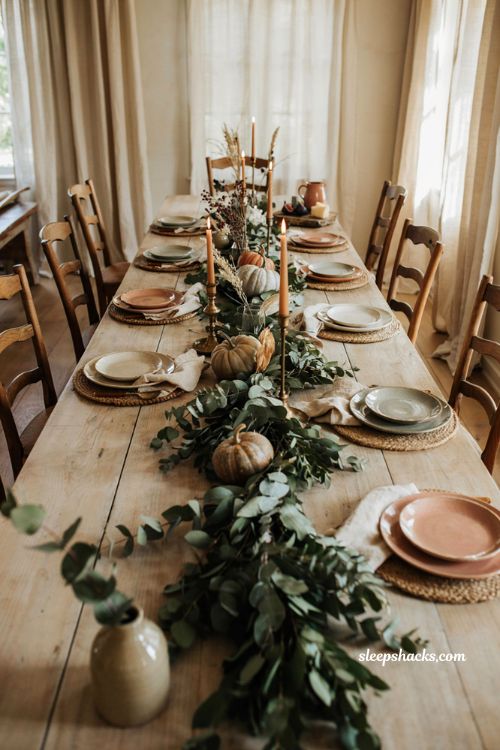 Fall eucalyptus table runner with heirloom pumpkins and rustic dining table