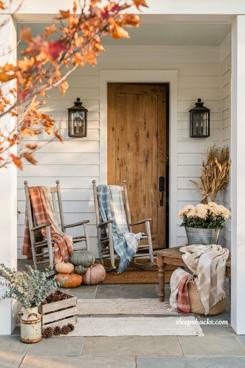 Fall front porch decor ideas with plaid throws rocking chairs and cozy farmhouse style