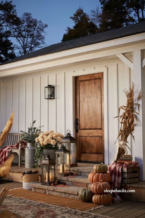Fall front porch lantern ideas with cozy candle glow and farmhouse autumn decor