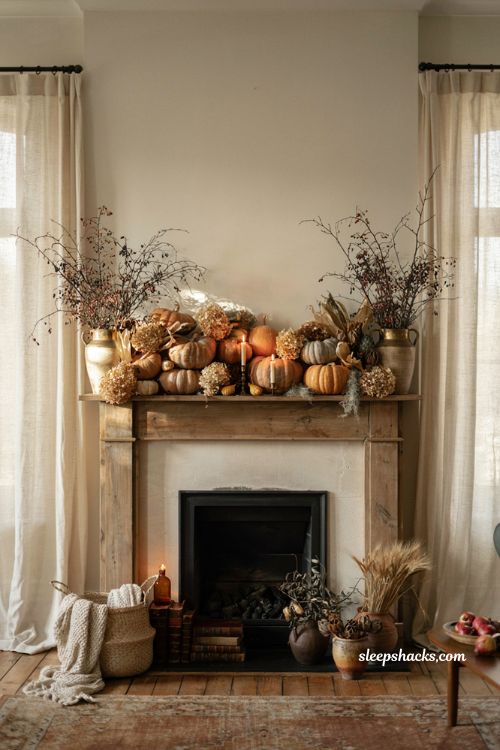 Fall mantel with harvest gourds dried hydrangeas and layered autumn decor