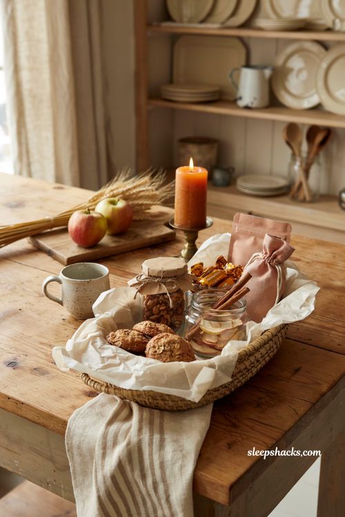 Fall snack and treat basket with spiced nuts apple chips caramel and cider mix