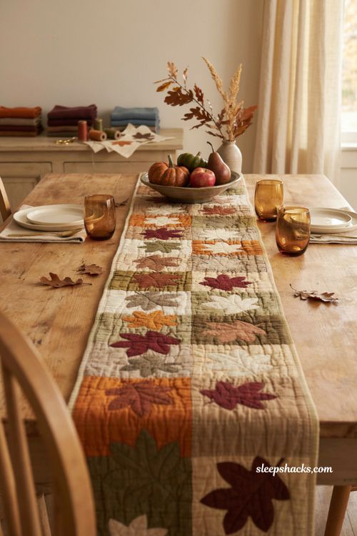 Falling leaves fall table runner with simple quilted leaf motifs cozy versatile autumn dining table