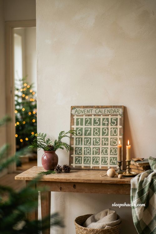 Farmhouse Christmas countdown sign painting on wood with rustic advent numbers