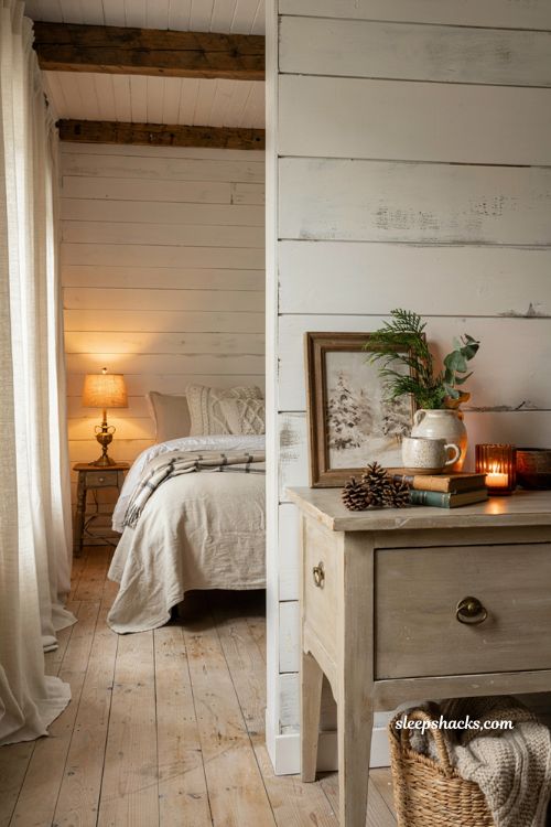Farmhouse christmas bedroom with a rustic framed holiday accent on a vintage dresser
