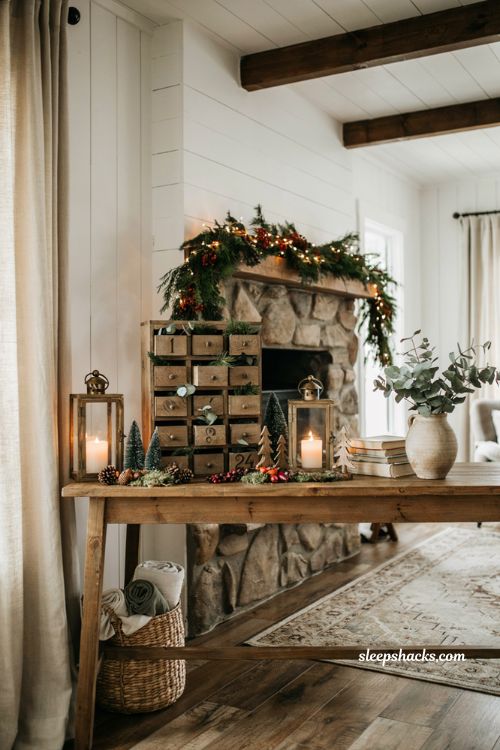 Farmhouse christmas decor with a handmade wooden advent calendar and natural greenery