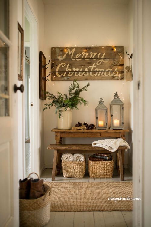 Farmhouse christmas entryway decor with distressed merry christmas wood sign