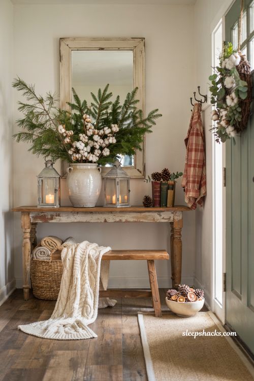 Farmhouse christmas entryway decor with flocked mini tree in cozy entry corner