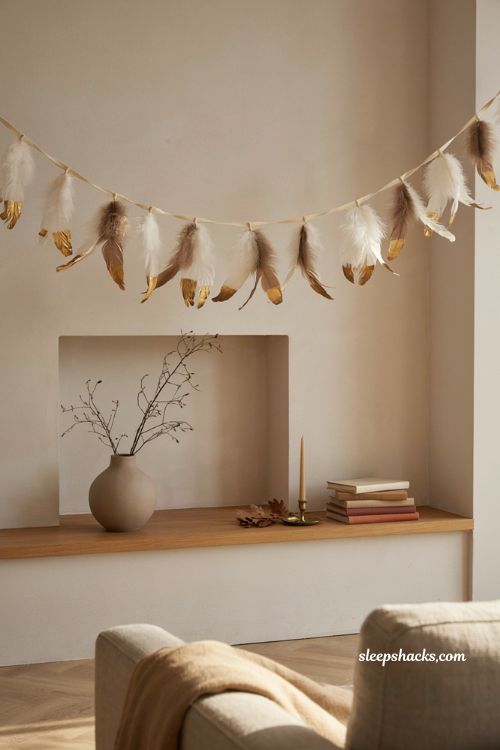 Feather fall garland with gold tipped white and brown feathers